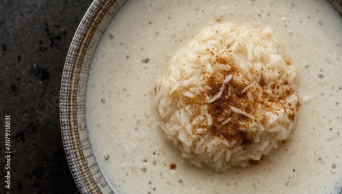 Bowl of creamy soup topped ...