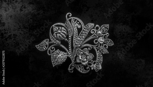 Silver floral brooch with i...