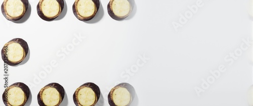 Top view of raw eggplant sl...
