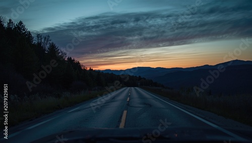 Remote mountain road fading...