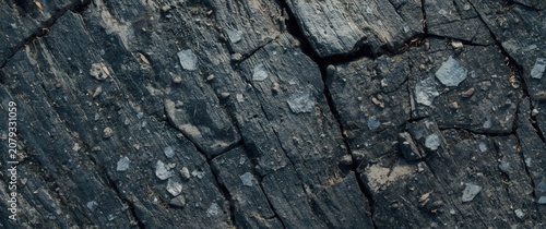 Blackened wood surface with...