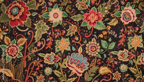 Mughal style ornamental embroidery highlighting rich colorful floral elements