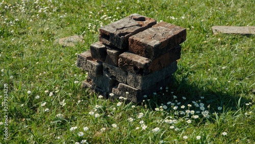 Stack of weathered bricks o...