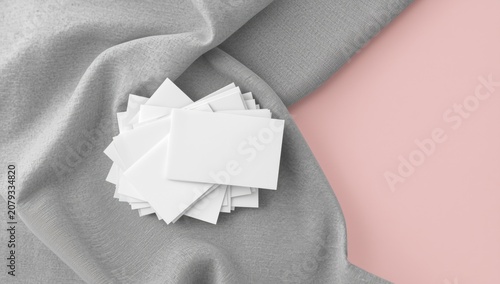 Blank business cards on gra...
