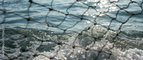 Waves splashing against a f...