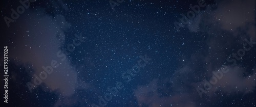 Starry night sky with cloud...