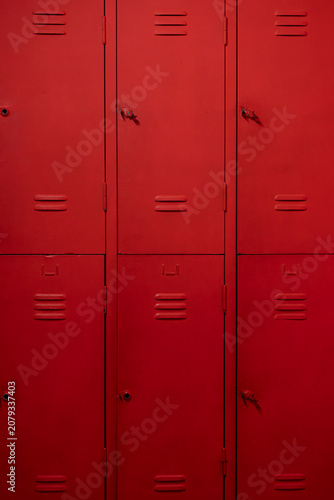 Industrial Red Metal Cabinet for Storage. Industrial Steel Cabinet in Bright Red Color. Red Metal Storage Cabinet Close Up.