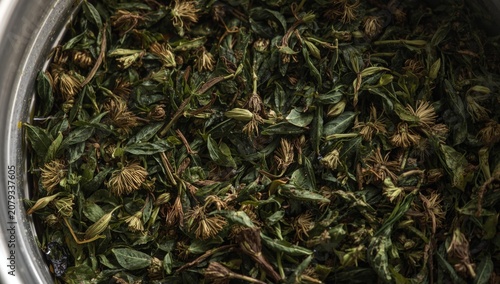 Dried green herbs mixed wit...