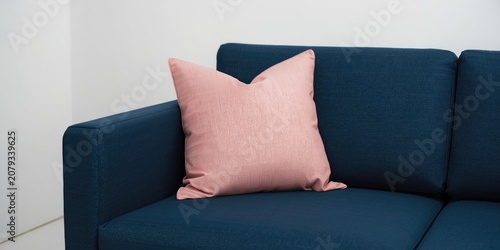 Pink decorative pillow on a...