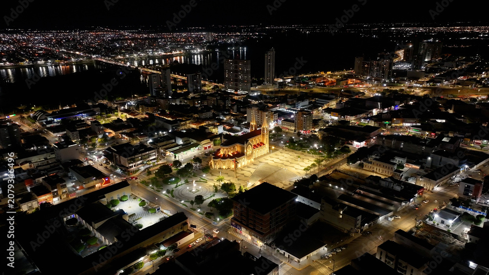 Obraz premium Night Dom Malan Square At Petrolina In Pernambuco Brazil. Sagrado Coracao De Jesus Cathedral. Illuminated Church. Downtown District. Dom Malan Square At Petrolina In Pernambuco. City At Night Skyline.
