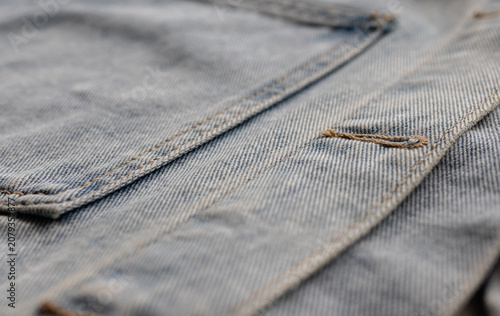 Konstfotografi Close-up of denim jacket seam and buttonhole