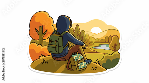 Person sitting on hill with backpack.