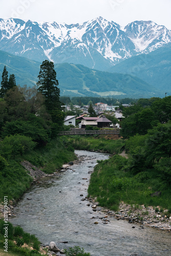 Mountain river village snow...