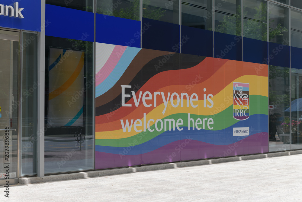 Obraz premium exterior glass curtain wall with Pride flag at RBC Water Park Place, 88 Queens Quay W, Toronto