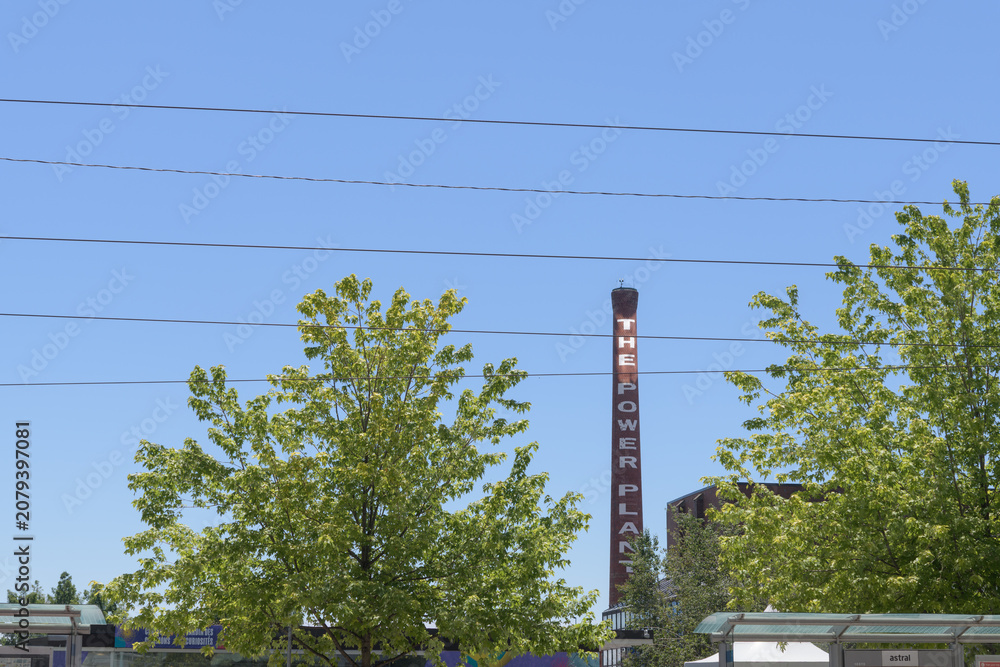 Obraz premium wide view of the original industrial smokestack from the former Toronto Power Plant building (now The Power Plant Contemporary Art Gallery), Harbourfront Centre