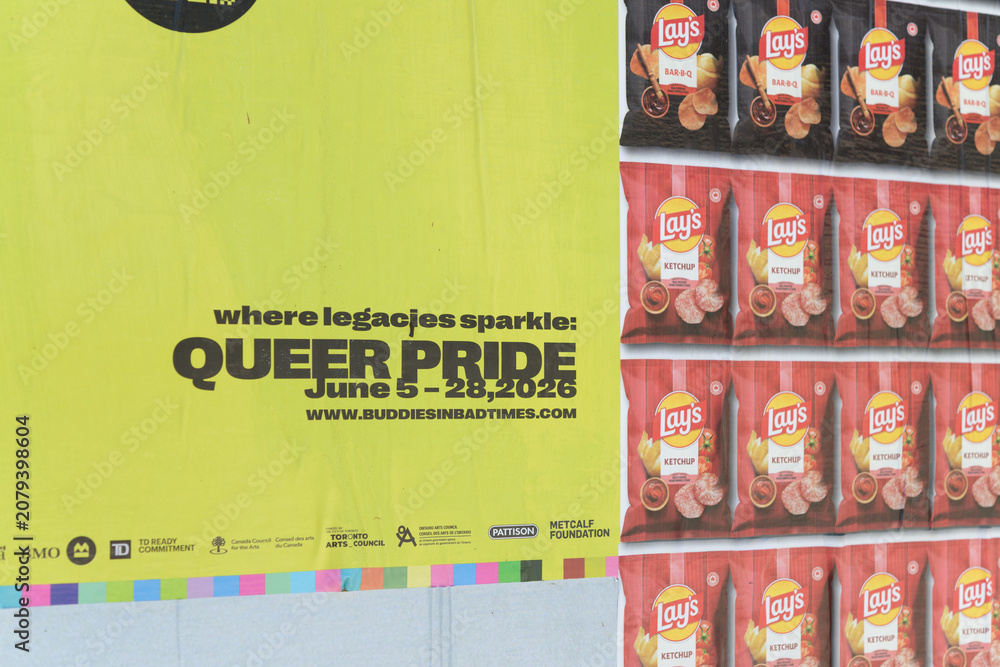 Obraz premium street posters on hoarding in Toronto (Queer Pride and Lay's Potato Chips)