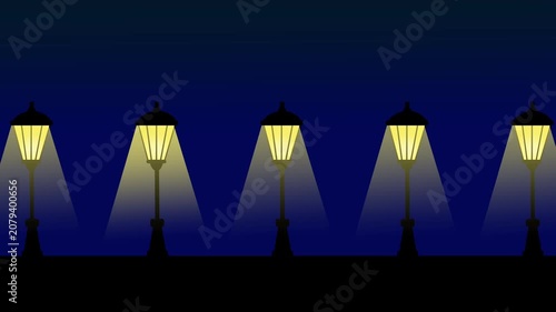 A row of classic street lamps illuminating the darkness with bright yellow beams against a deep blue night sky gradient.