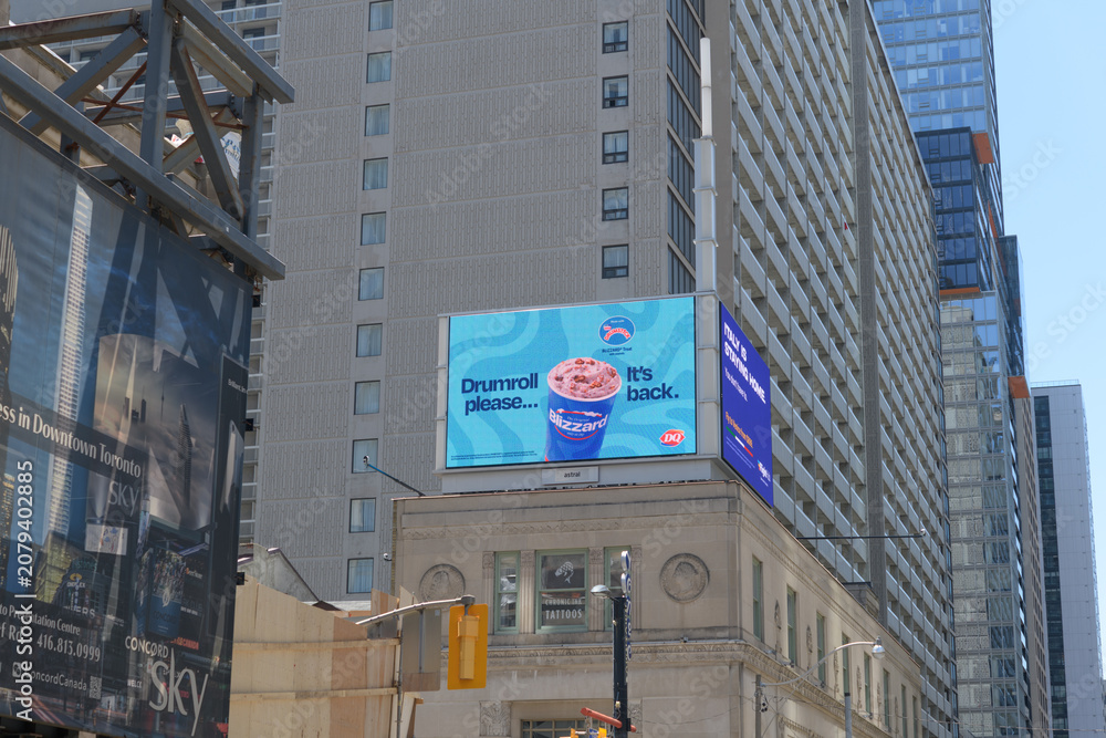 Obraz premium rooftop electronic billboard atop the historic Dominion Bank Building by John M Lyle, 1930, Gerrard St W and Yonge St, Toronto (DQ)