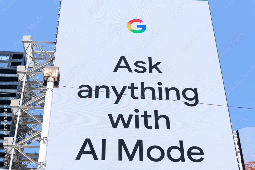 Fototapeta premium bright white Google billboard lights up Sankofa Square in Toronto, pushing the slogan 