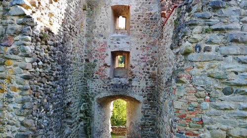 Drone Reveal of Ancient Stone Castle Ruins in Forest