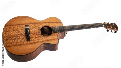 Photography Isolated professional acoustic guitar with a beautiful figured wood top and a cutaway design