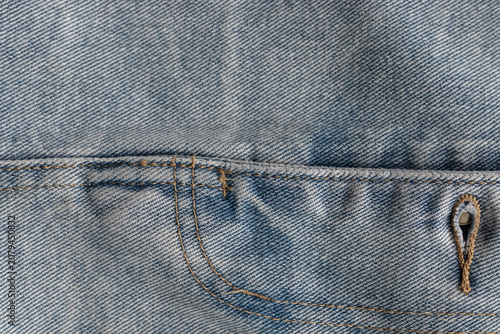 фотографія Macro view of denim pocket seam and buttonhole