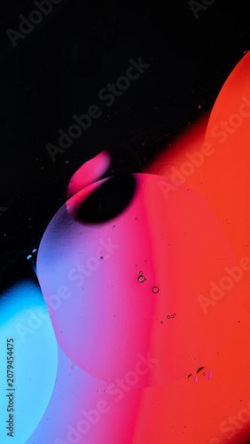 Liquid colorful bubbles forming abstract surface texture