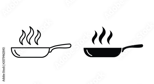 Two pans with steam on stovetop