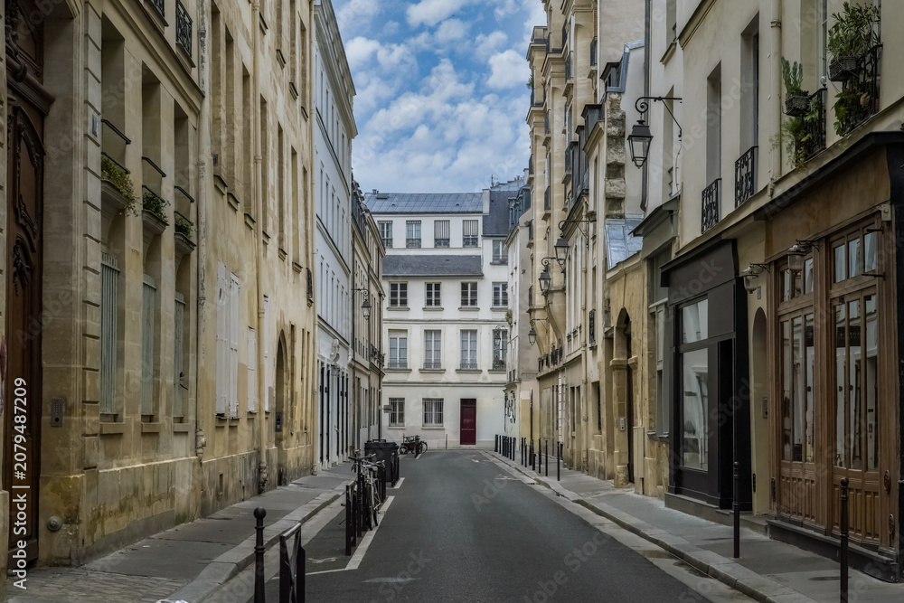 Fototapeta premium Paris, typical buildings in the Marais, rue Charlemagne, in the center of the french capital 