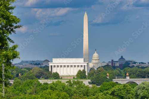 Washington DC skyline with major monuments including Lincoln Memorial and Washington Monument, and Capitol.