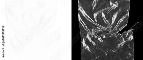 Tableau sur toile Crumpled plastic texture overlay, wrinkled transparent film on black background,