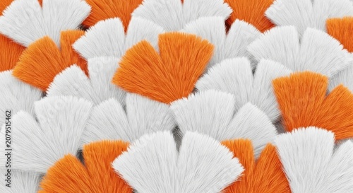 Closeup view of multiple white and orange bristle brush heads arranged tightly together in a pattern  bristles are fanned out