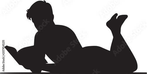 Foto Handsome guy reading a book while lying on the carpet