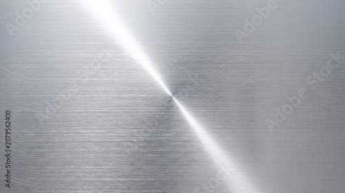 Brushed Silver Metal Texture Background with Polished Stainless Steel Surface and Metallic Reflection Pattern