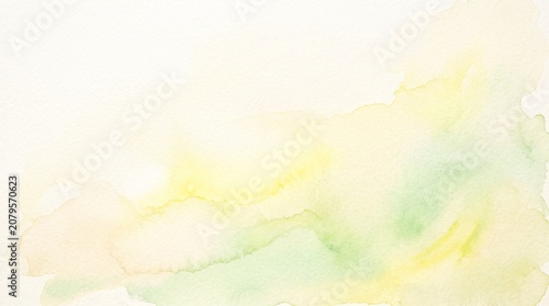 Quadro su tela Soft watercolor wash background with pastel yellow and green hues