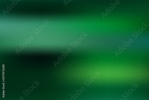 Blurry green abstract background with light effects