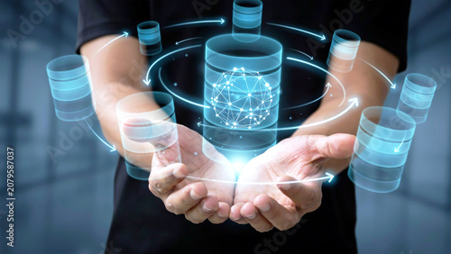 Person's hands holding a luminous digital network of servers, symbolizing secure cloud computing, advanced data management, and the future of information technology