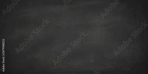 Foto Grunge vintage black chalkboard texture with chalk dust and smudges, empty dark