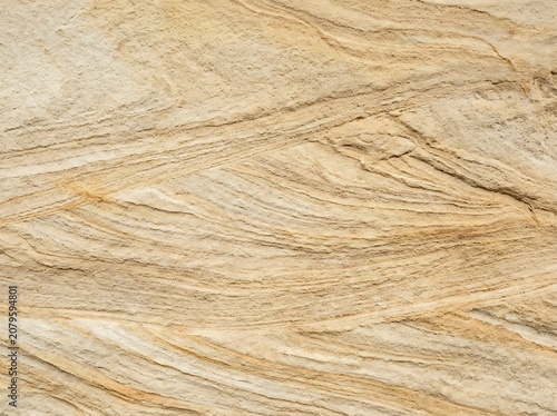 Natural Sandstone Rock Texture with Wavy Layers and Abstract Geological Patterns