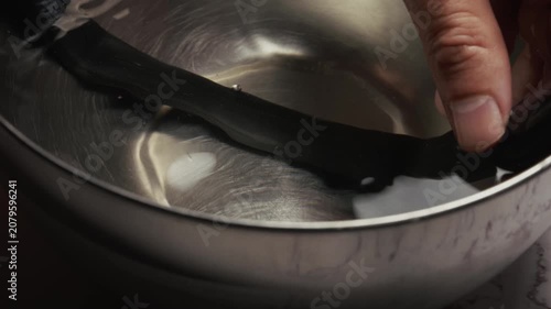 Testing Flat Inner Tube in Water bucket for Air Bubbles
