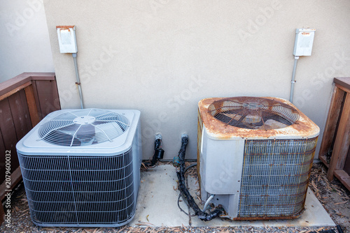 Photography Residential HVAC setup showcasing a brand new grey air conditioner alongside a w