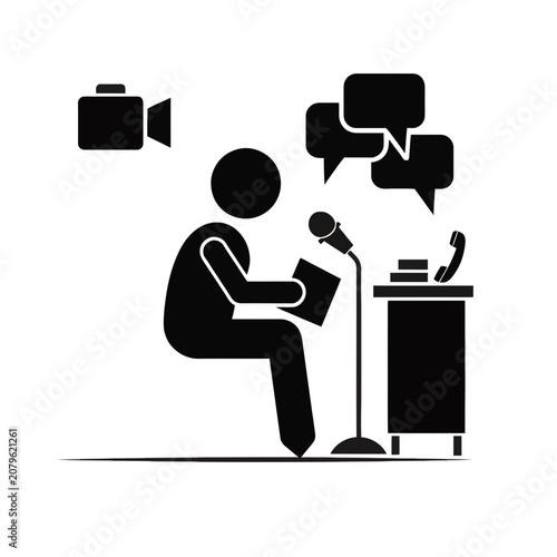 Bild auf Leinwand Broadcaster sits at a desk with a microphone while recording a podcast or live radio segment