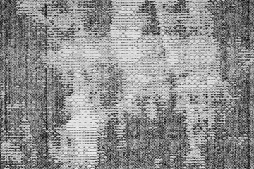 Monochrome macro shot of an inkjet print on a white piece of paper, with interesting patterns and digital textures