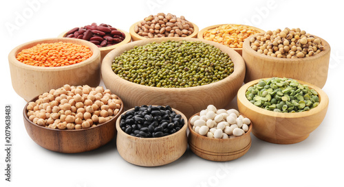 Schilderij op canvas Different types of legumes in bowls isolated on white