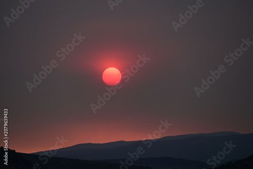 Wildfire enhanced sunset and cloudscape over Grass Valley in western Colorado on June 28, 2026.