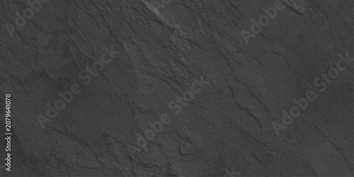 Tableau sur toile abstract dark slate stone textured background with natural striations and uneven