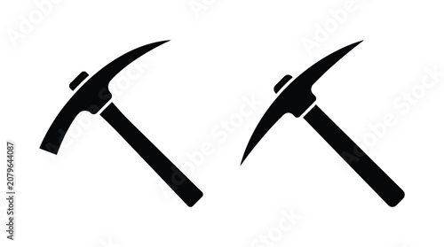 Fotografie Two Pickaxes Black Silhouette On White Background