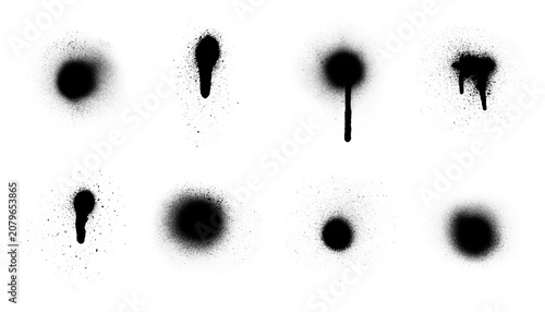Fotografie Variety of black spray paint marks, including solid circles, elongated strokes, and distinct drips, isolated on transparent background, perfect for adding urban flair