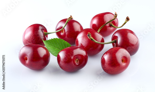 Cherry in closeup with leaf
