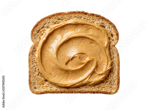Slice of toasted bread with creamy peanut butter isolated on transparent background